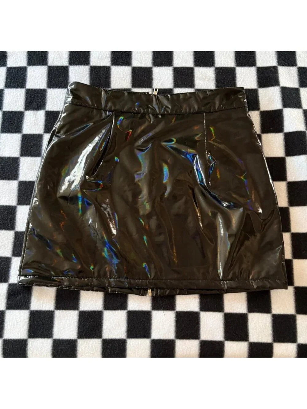 Black holographic zipped mini skirt